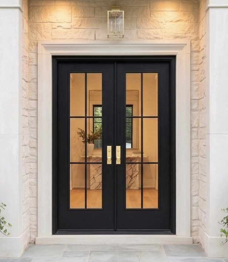 Black double doors with glass panels on a stone building facade